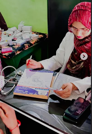 Dr. Tarannum reviewing a consultation record